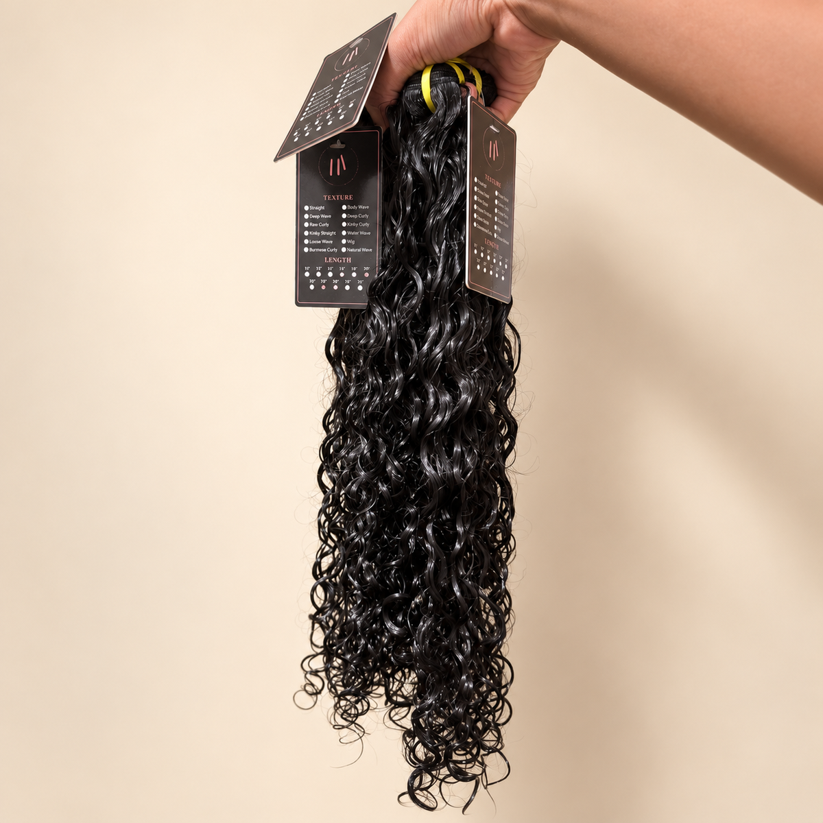 The Allure Premium Virgin Burmese Curly bundle on warm cream background